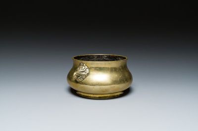 A Chinese bronze elephant-head-handled censer, Xuande mark, Kangxi/Qianlong