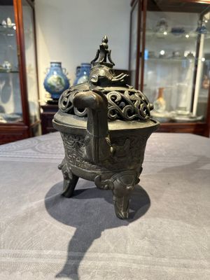 A Chinese bronze 'elephant' tripod censer and cover, Ming — photo 2