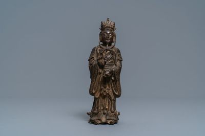 A Chinese bronze figure of a dignitary, Ming