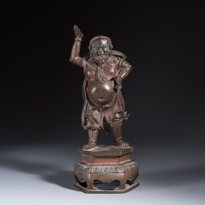 A Chinese bronze figure of a foreigner standing on a pedestal — photo 2