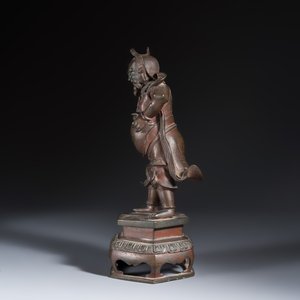 A Chinese bronze figure of a foreigner standing on a pedestal — photo 3