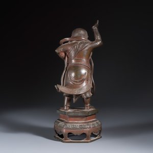 A Chinese bronze figure of a foreigner standing on a pedestal — photo 4