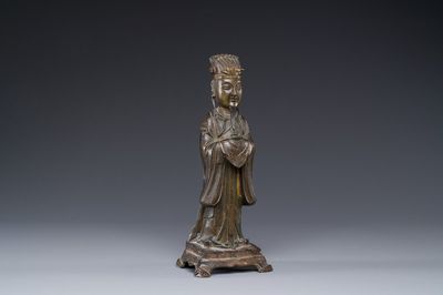 A Chinese bronze figure of an official, Ming