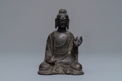 A Chinese bronze figure of Buddha, Ming