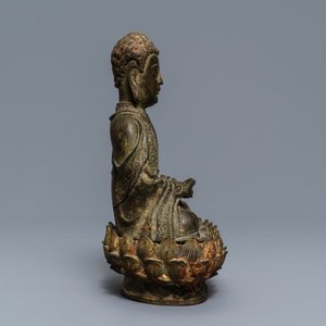 A Chinese bronze figure of Buddha on a lotus throne, Ming — photo 4