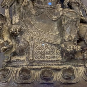 A Chinese bronze figure of Guanyin on a qilin, Ming — photo 15