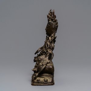 A Chinese bronze figure of Guanyin on a qilin, Ming — photo 2