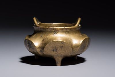 A Chinese bronze flower-shaped tripod censer with handles, Xuande mark, 19th C.
