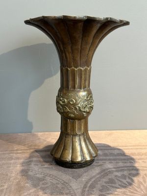 A Chinese bronze 'gu' vase with chilong, Xuande mark, late Ming/early Qing — photo 1
