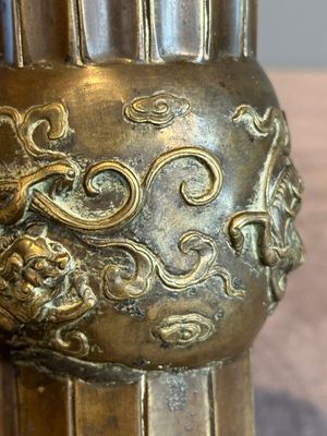 A Chinese bronze 'gu' vase with chilong, Xuande mark, late Ming/early Qing — photo 9