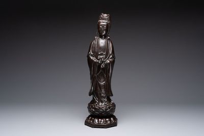 A Chinese bronze Guanyin standing on a lotus throne, 19th C.