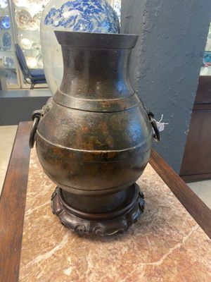 A Chinese bronze 'hu' vase with Han-style taotie handles on wooden stand, Ming — photo 10