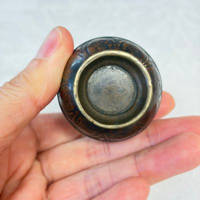 A Chinese bronze miniature vase and a stone-inset gilt-bronze belt buckle — photo 12