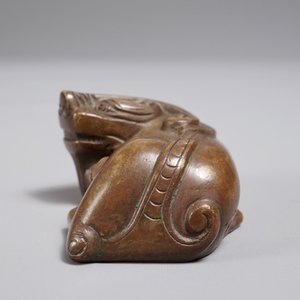 A Chinese bronze scroll or paper weight shaped as a Buddhist lion or Shishi, 18/19th C. — photo 5
