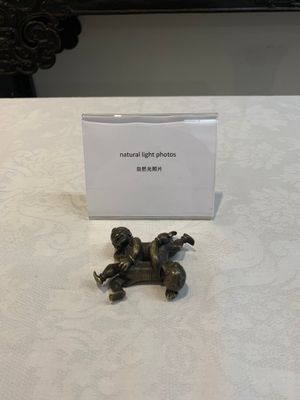 A Chinese bronze scroll weight in shape of two boys, Qing — photo 1
