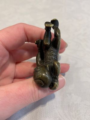 A Chinese bronze scroll weight in shape of two boys, Qing — photo 4
