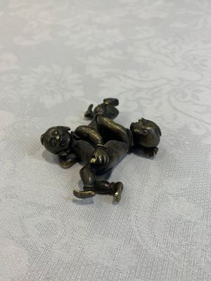 A Chinese bronze scroll weight in shape of two boys, Qing — photo 8