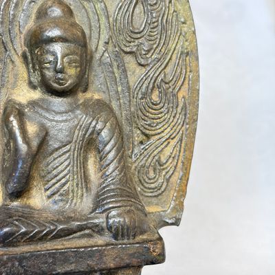 A Chinese bronze seated Buddha with a flaming halo — photo 9