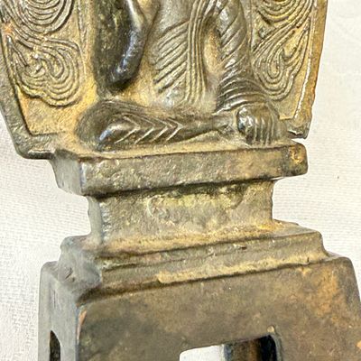 A Chinese bronze seated Buddha with a flaming halo — photo 10