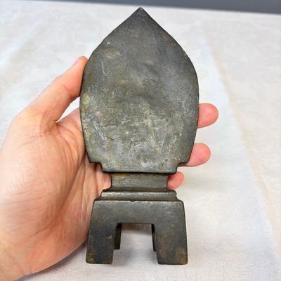 A Chinese bronze seated Buddha with a flaming halo — photo 12