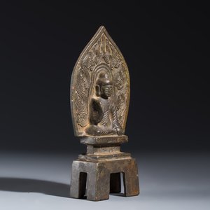 A Chinese bronze seated Buddha with a flaming halo — photo 2