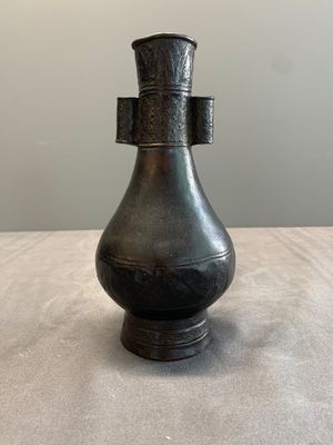 A Chinese bronze 'touhu' vase, Yuan — photo 1