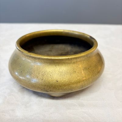 A Chinese bronze tripod censer — photo 1