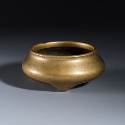 A Chinese bronze tripod censer, Xuande mark, 17th C.
