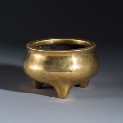 A Chinese bronze tripod censer, Xuande mark, 17/18th C.