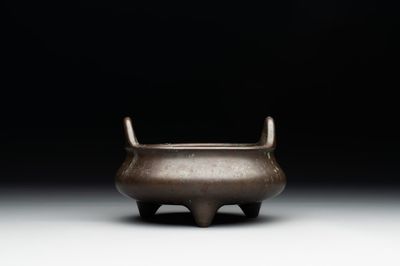 A Chinese bronze tripod censer, Guan Huai Tang Zhu Ren 冠槐堂主人 mark, 17/18th C.