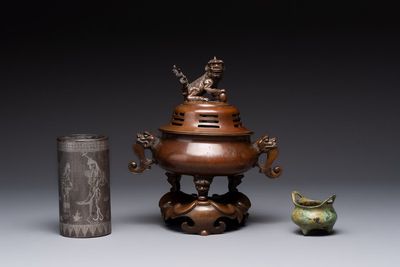 A Chinese bronze tripod censer with cover and stand, a small tripod censer and a silver-inlaid iron brush pot, 19/20th C.