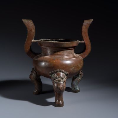 A Chinese bronze tripod censer with handles, Ming