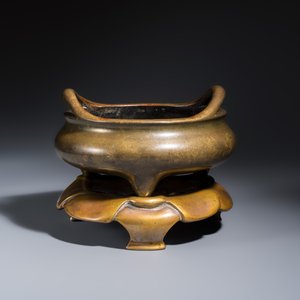 A Chinese bronze tripod censer with handles and stand — photo 1