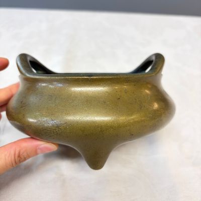 A Chinese bronze tripod censer with handles and stand — photo 8