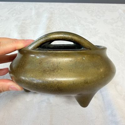 A Chinese bronze tripod censer with handles and stand — photo 9