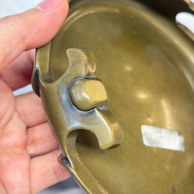 A Chinese bronze tripod censer with handles and stand — photo 20