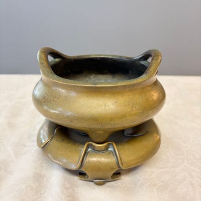 A Chinese bronze tripod censer with handles and stand — photo 1