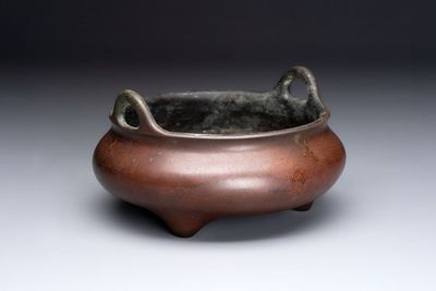 A Chinese bronze tripod censer, Xuande mark, 17/18th C.