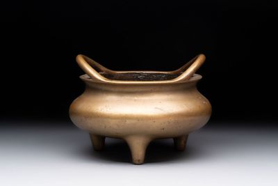 A Chinese bronze tripod censer, Xuande mark, 18th C.