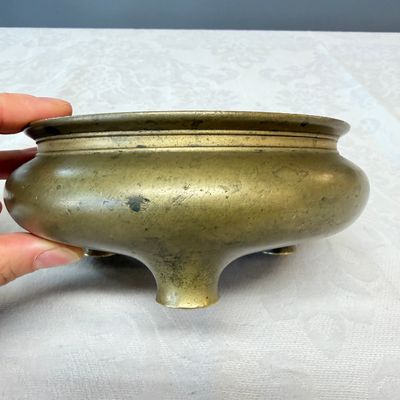 A Chinese bronze tripod censer — photo 1