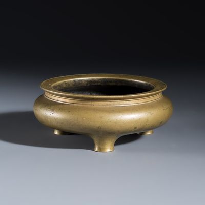 A Chinese bronze tripod censer, Xuande mark, 16/17th C.