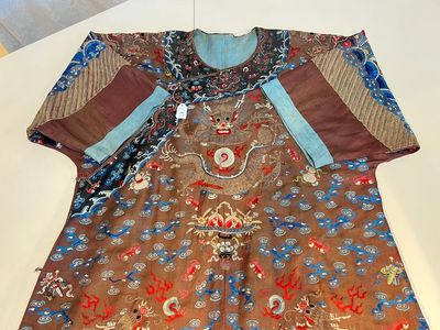 A Chinese brown-ground embroidered silk 'Dragon' robe, 'Ji Fu' 吉服, 19th C. — photo 1