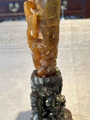 A Chinese buffalo horn carving of a landscape with a pagoda on wooden stand, Qing — photo 11