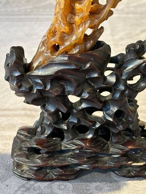 A Chinese buffalo horn carving of a landscape with a pagoda on wooden stand, Qing — photo 17