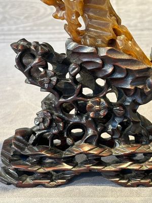 A Chinese buffalo horn carving of a landscape with a pagoda on wooden stand, Qing — photo 7
