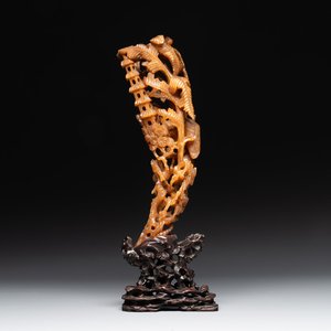 A Chinese buffalo horn carving of a landscape with a pagoda on wooden stand, Qing — photo 1