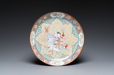 A Chinese Canton enamel dish with a lady and two boys, Yongzheng