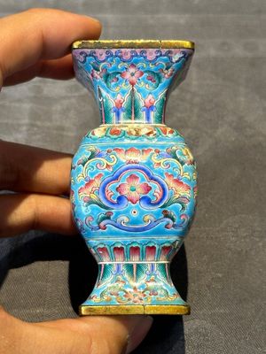 A Chinese Canton enamel 'gu' vase with floral design, Qianlong mark and of the period — photo 2