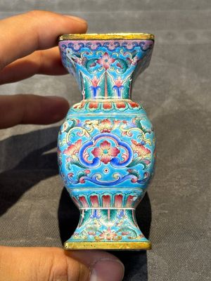 A Chinese Canton enamel 'gu' vase with floral design, Qianlong mark and of the period — photo 3