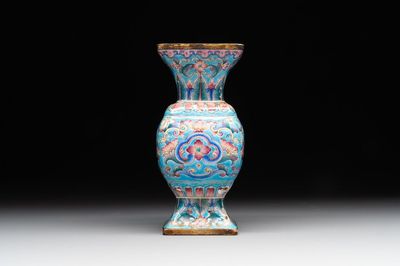 A Chinese Canton enamel 'gu' vase with floral design, Qianlong mark and of the period